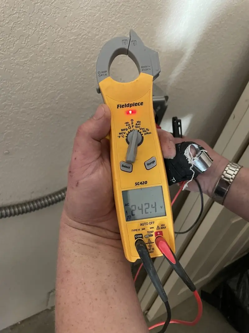 Voltage testing with clamp meter during Whole House Surge Protector in Hahira